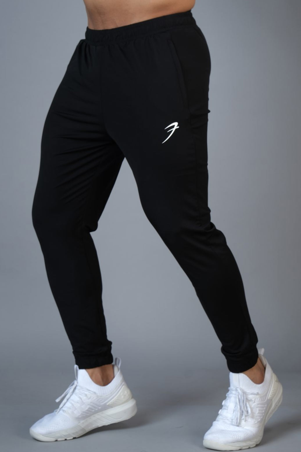 OFF-WHITE: Off White nylon jogging trousers with logo - Black | OFF-WHITE  pants OMCA086E20FAB002 online at GIGLIO.COM