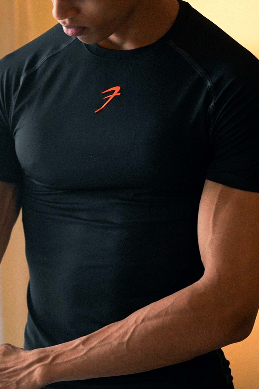 Compression T-shirt Black / Orange Logo